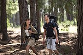 Young couple hiking in forest