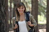 Young woman hiking in forest