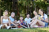 Portrait of family enjoying picnic