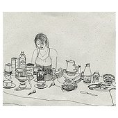 Woman sitting at breakfast table
