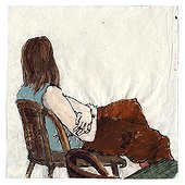 Woman sitting in chair