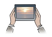 Illustration of hands holding digital tablet showing tranquil sunset