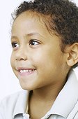 Close up of mixed race boy smiling