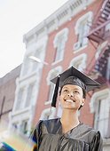 African woman in graduation cap and gown