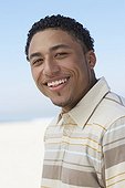 Young mixed race man smiling