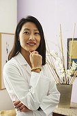 Asian female doctor in office