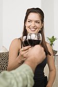 Smiling woman toasting