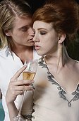Passionate Young Couple at Party