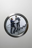 Two Businessmen Exchanging Briefcase on Staircase