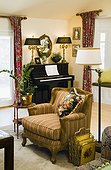 Upright Piano in Corner of Living Room