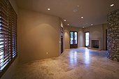 Marble Floor and Stone Wall in Living Room of Contemporary House