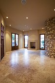 Marble Floor and Curved Stone Wall in Contemporary House