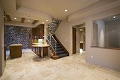 Stone Walls in Kitchen and Stairwell of Contemporary House