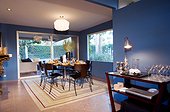 Modern Dining Table and Chairs in Blue Dining Room