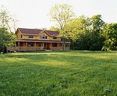Large Lawn in Front of Log House