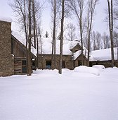 Wood and Stone House in Winter