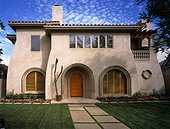Contemporary Stucco House with Curved Walls