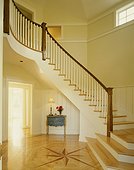 Curved Staircase in Foyer