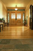Tile and Wood Floors in Foyer