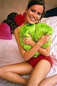 Young woman with cushion