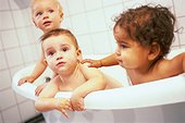 Three toddlers in the bathtub