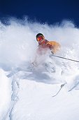 Person skiing downhill