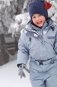 Boy in snowy landscape