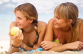 Two young women on the beach