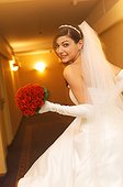 Laughing bride with bridal bouquet