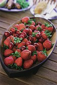 Bowl of fresh cherries and strawberries