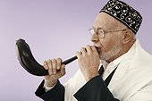 Jewish man blowing the shofar
