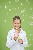 Girl making bubbles