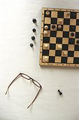 Chess Board and Glasses standing on Table