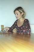 Woman playing a Board Game