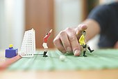 Man playing with a Table Soccer Game (Detail)