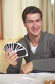 Man holding Playing Cards