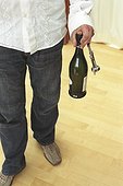 Man (Detail) carrying Champage Bottle and Corkscrew