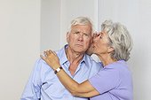 Senior couple whispering