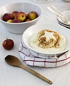 Simple meal with apples and cottage cheese on table