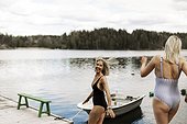 Happy women at lake