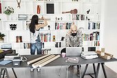 Male and female architects working at home office