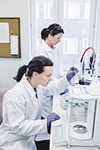 Female scientists working in laboratory
