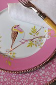 Elegant plate with bird imprint