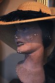 Womans bust with hat
