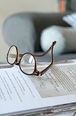 Eyeglasses on book