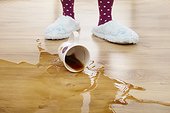coffee cup fallen on the floor