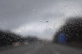 raindrops on windshield in autumn