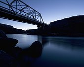 silhouette of a bridge going over a river at dusk; new mexico united states of america
