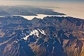 Aerial view of the Chugach Mountains and fog covering Cook Inlet and Turnagain Arm, Southcentral Alaska, Autumn