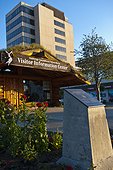 The Anchorage Visitors Center log cabin in downtown Anchorage, Southcentral Alaska, Summer